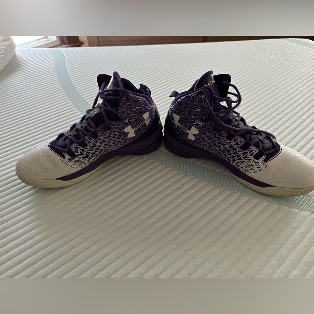 Men’s Under Armour basketball sneakers.